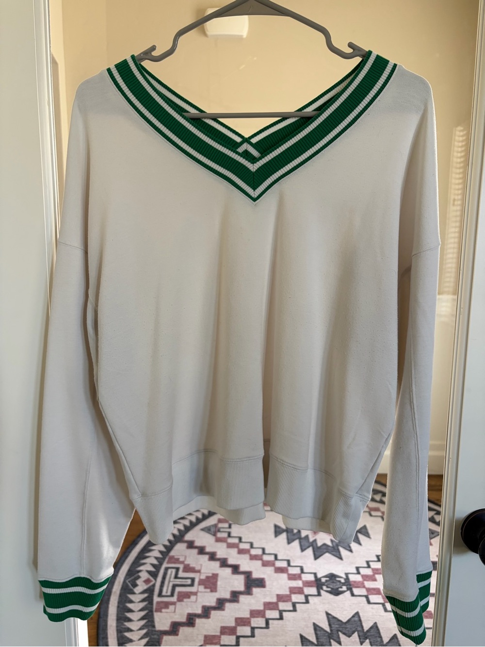 Thrive White V-Neck Sweater with Green Trim